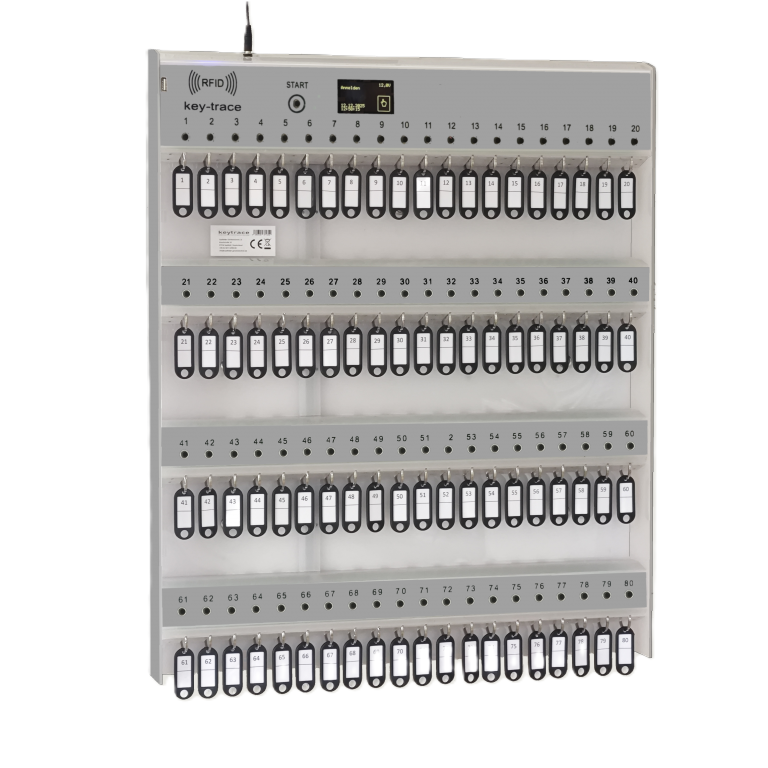 Équipement de stockage avec plusieurs porte-clés organisés sur une grille.