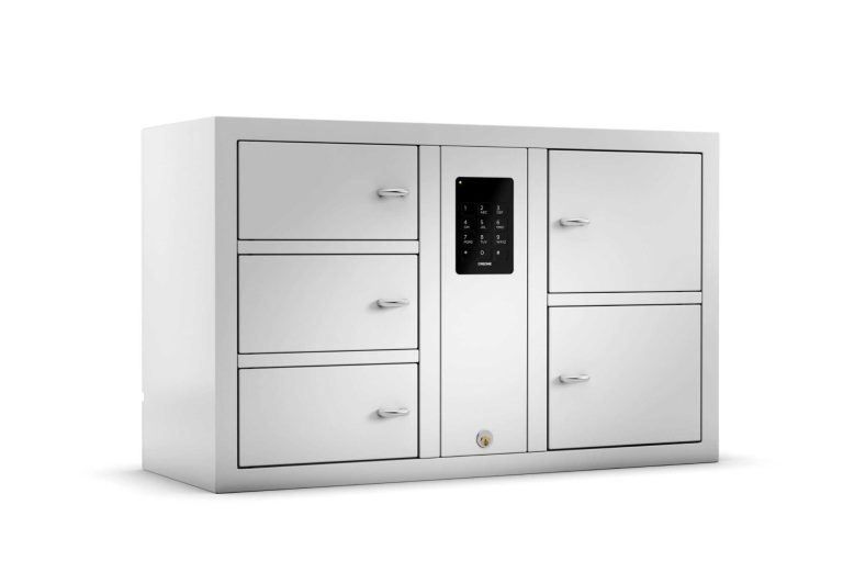 Armoire à objets blanche avec plusieurs tiroirs et un panneau de contrôle central.